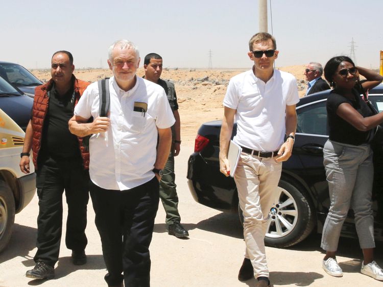 Britain&#39;s opposition leader Jeremy Corbyn walks during his visit to Al Zaatari refugee camp, in the Jordanian city of Mafraq, near the border with Syria, June 22, 2018. REUTERS/Muhammad Hamed