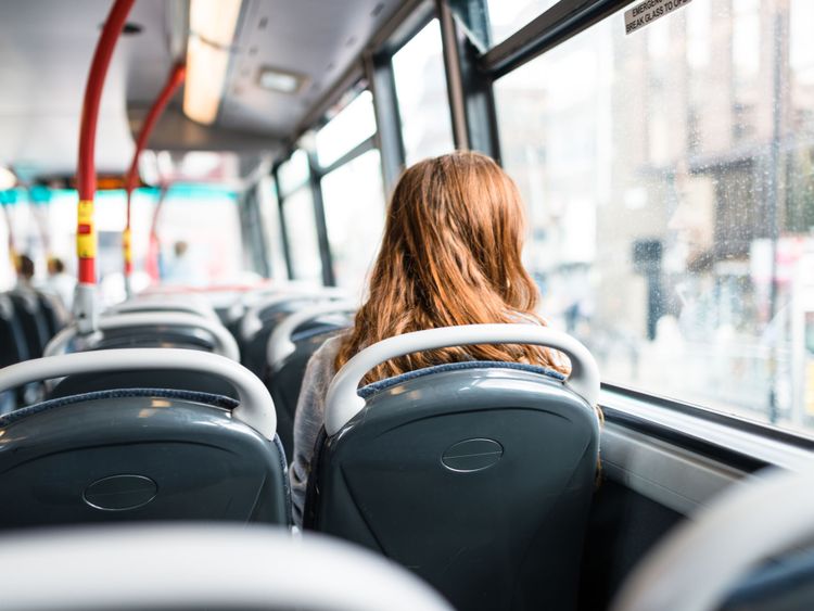 A woman on a bus