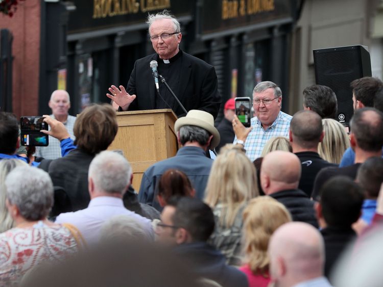 Catholic bishop of Derry Donal McKeown speaking at a rally on Fahan street, Londonderry, in protest against the ongoing violence and disorder