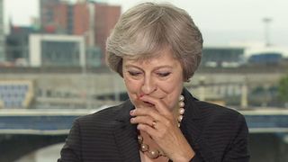 Theresa May pauses for breath during a speech on Northern Ireland and Brexit