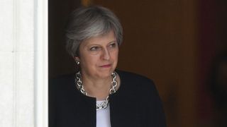 Prime Minister Theresa May waits to greet South African President Cyril Ramaphosa in Downing Street