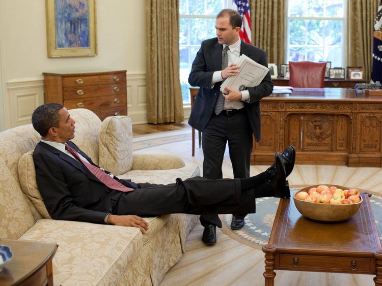 U.S. President Barack Obama talks with Deputy National Security Advisor for Strategic Communication Ben Rhodes