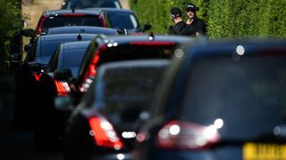 Ministerial cars line up as they arrive for the cabinet meeting