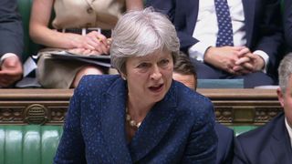 Theresa May addresses MPs in the Commons