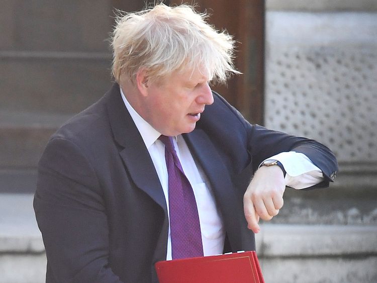 Boris Johnson walks to Downing Street 