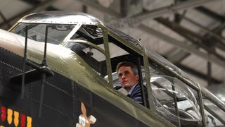 Defence Secretary Gavin Williamson looks out of the cockpit of an Avro Lancaster bomber during a visit to RAF Coningsby, where he announced that the multi million pound F-35 stealth fighter jets will start arriving at RAF Marham, Norfolk, early next month.