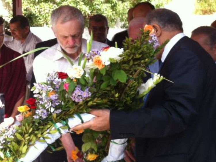 Jeremy Corbyn holds a wreath at the ceremony. Pic: Embassy of Palestine in Tunisia