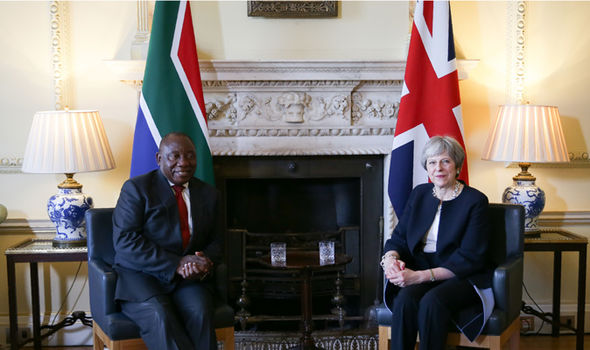 Theresa May and South Africa's President Cyril Ramaphosa.