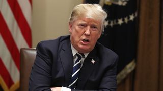 WASHINGTON, DC - JULY 17:  U.S. President Donald Trump talks the media about his meeting with Russian..Vladimir Putin in Helsinki, in the Cabinet Room on July 17, 2018 in Washington, DC. President Trump was holding a meeting with House members of the Ways and Means Committee.  (Photo by Mark Wilson/Getty Images)