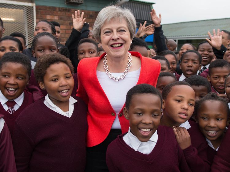 Prime Minister Theresa May meets students and staff at I.D. Mkize Secondary School in Cape Town
