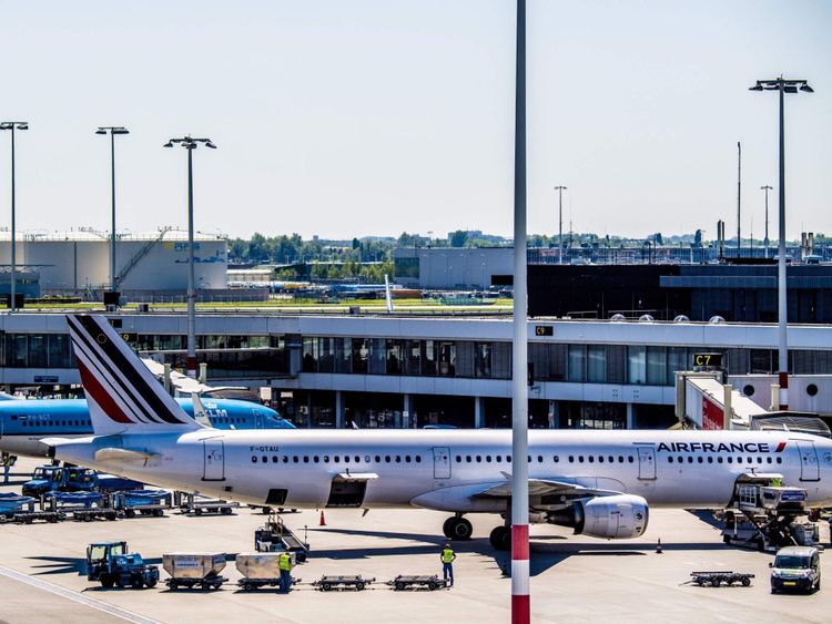 Air France and KLM aircrafts stand parked at Schiphol Airport, Netherlands, on May 7, 2018. - Air France shares went into a tailspin on the Paris stock exchange on May 7 after the strike-hit company&#39;s CEO resigned and the government seemed to worry about the carrier&#39;s very chances of survival. (Photo by Robin Utrecht / ANP / AFP) / Netherlands OUT (Photo credit should read ROBIN UTRECHT/AFP/Getty Images)
