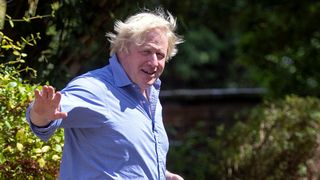 Boris Johnson arriving at his home in Oxfordshire