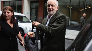 Mr Corbyn pictured arriving at the NEC meeting in London on Tuesday